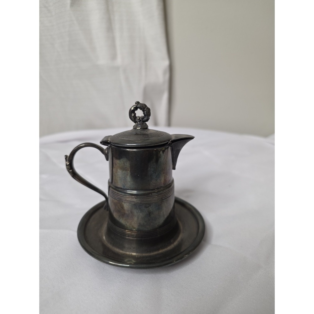 Marion Plate Co. Antique Quadruple plate syrup pitcher with attached tray